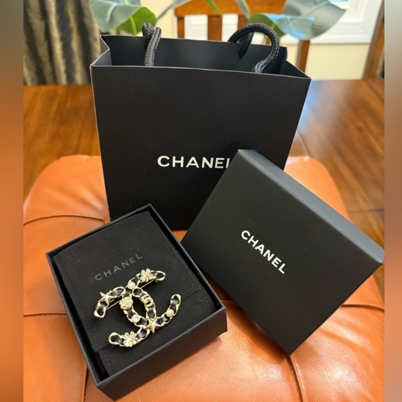 CHANEL Gold Brooch with Black Accents - Picture 1 of 5